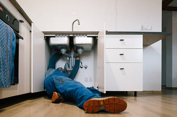 Professional Drain Cleaning technician working in Huntingtown, MD